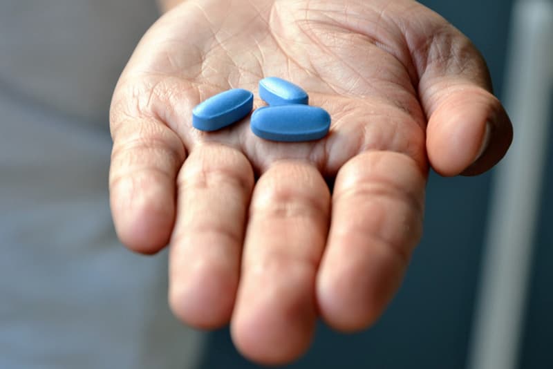 Viagra pills in the palm of a hand