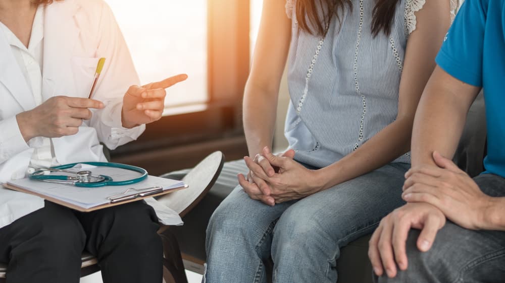 A female patient consulting her doctor about fertility concerns