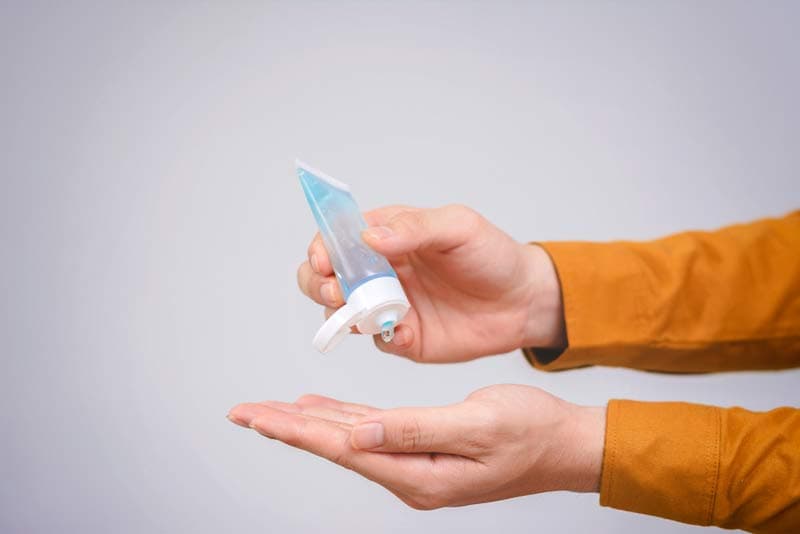 Hand sanitizer being applied to a hand