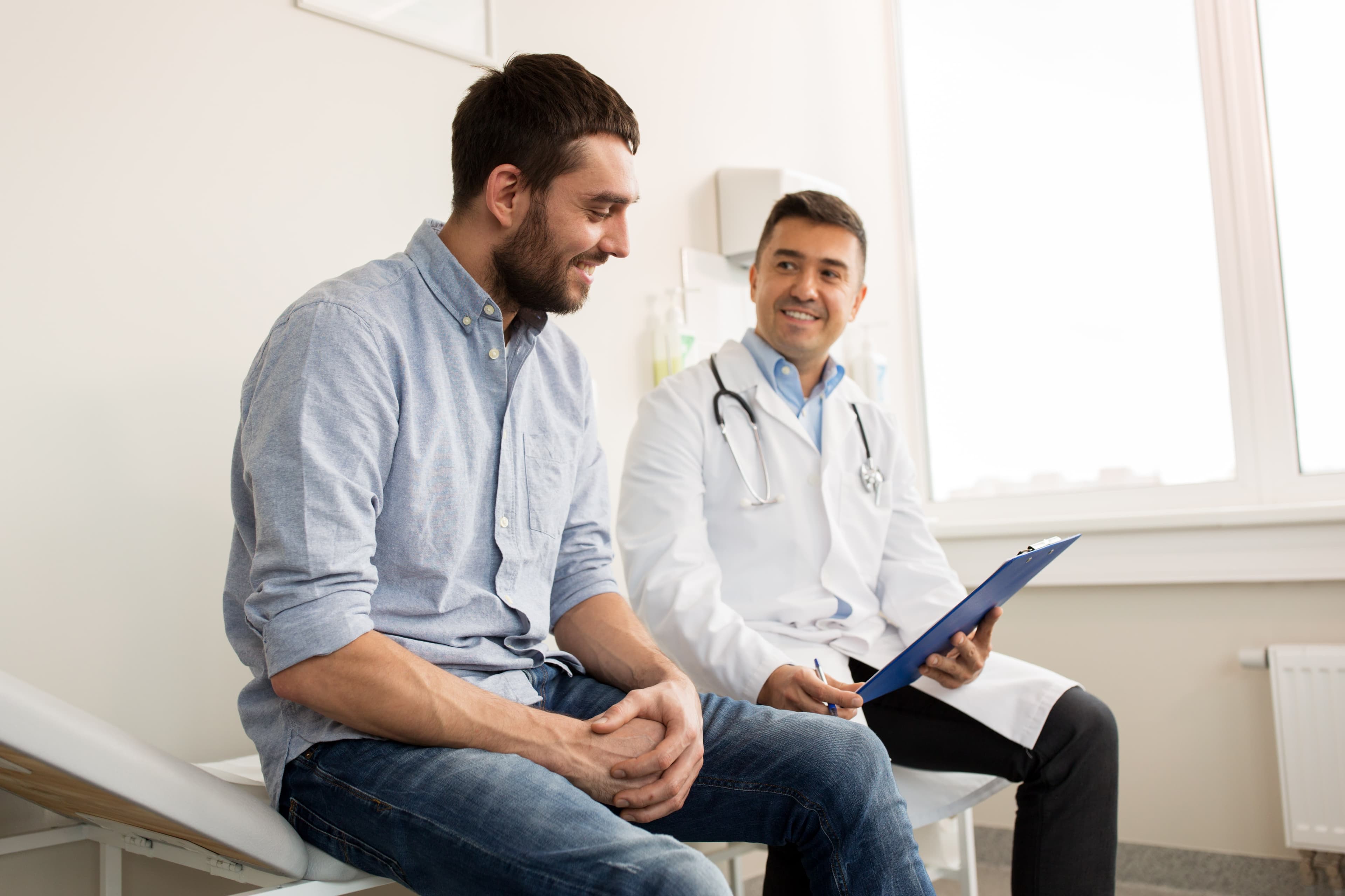 A doctor and a patient consulting with each other